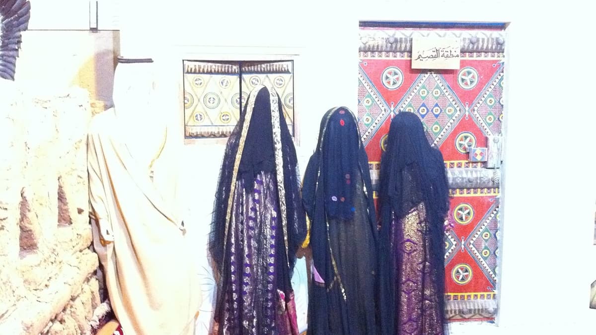 Wooden Dolls in Old Clothes
